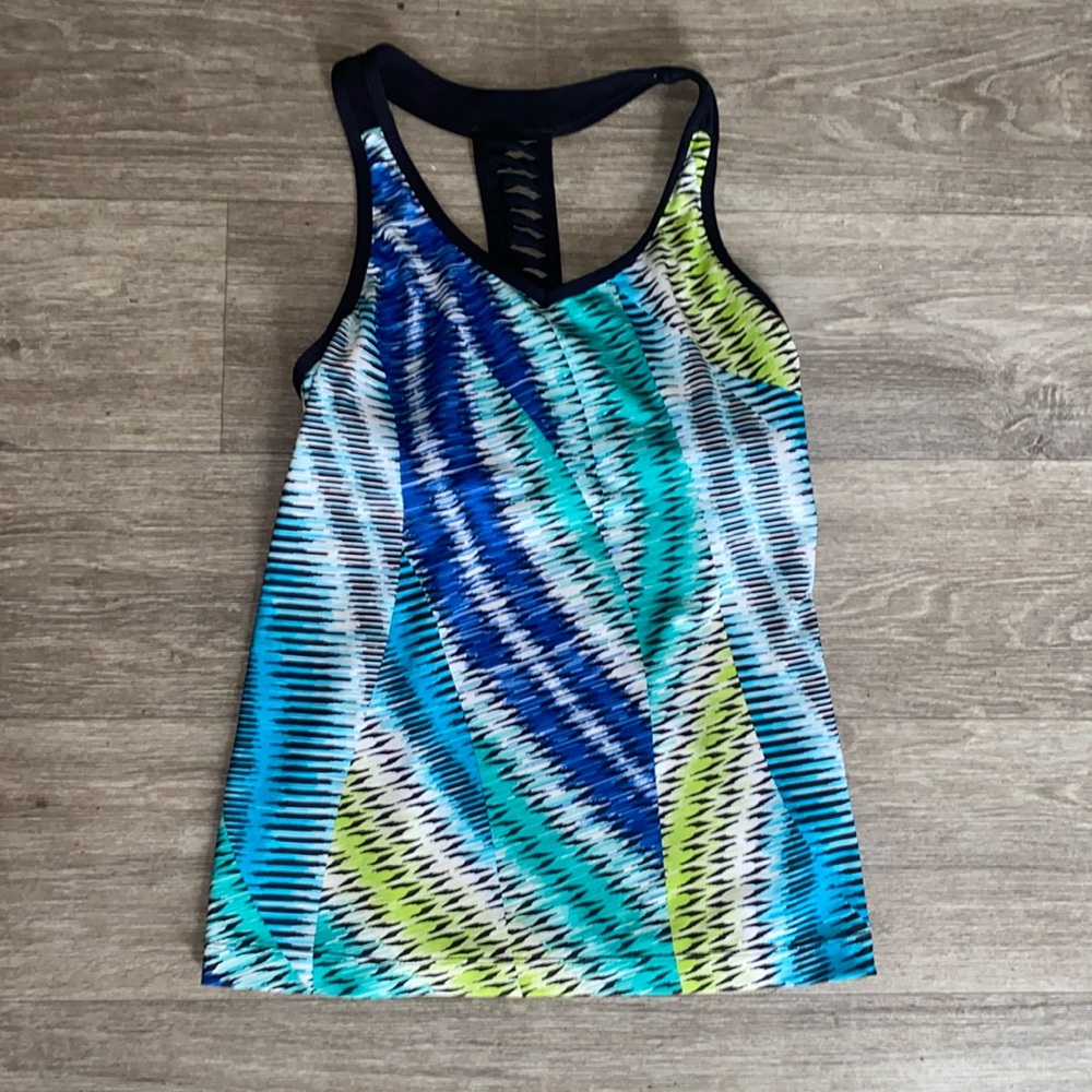 Xersion racerback tank top, designed for sports activities.